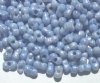 25 grams of 3x7mm Marble Blue Lustre Farfalle Seed Beads